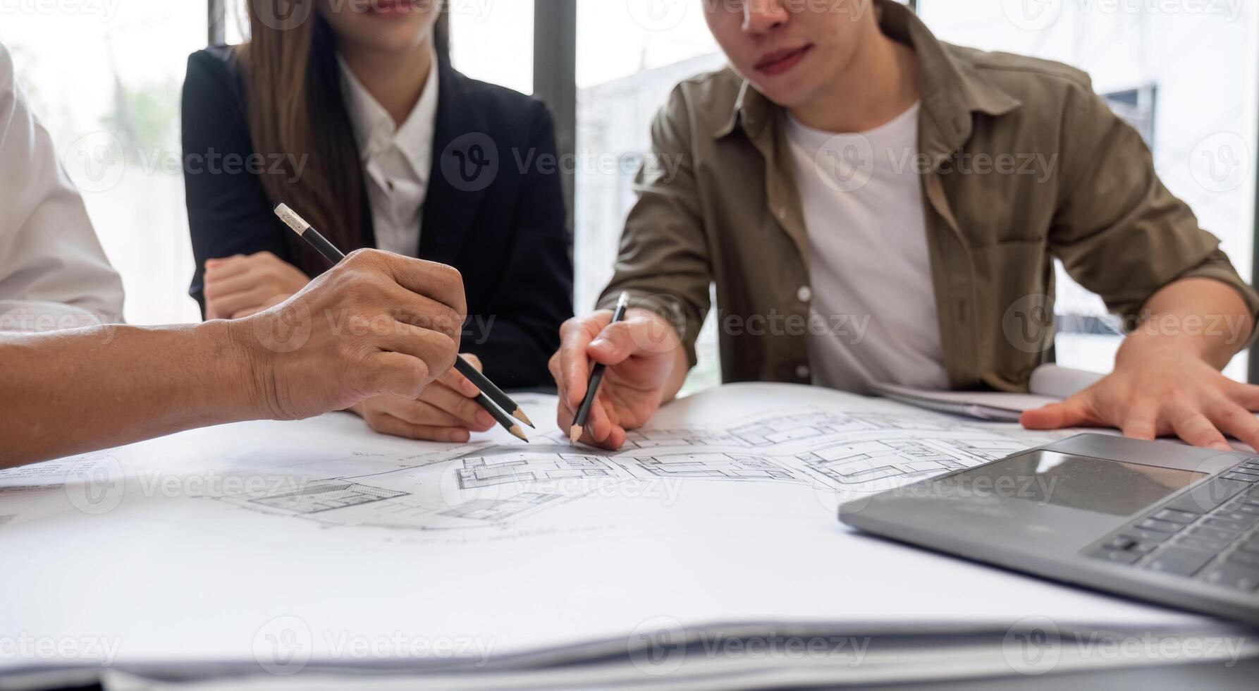 Business Team Collaborating on Project Plans During a Productive Meeting in a Modern Office Setting photo