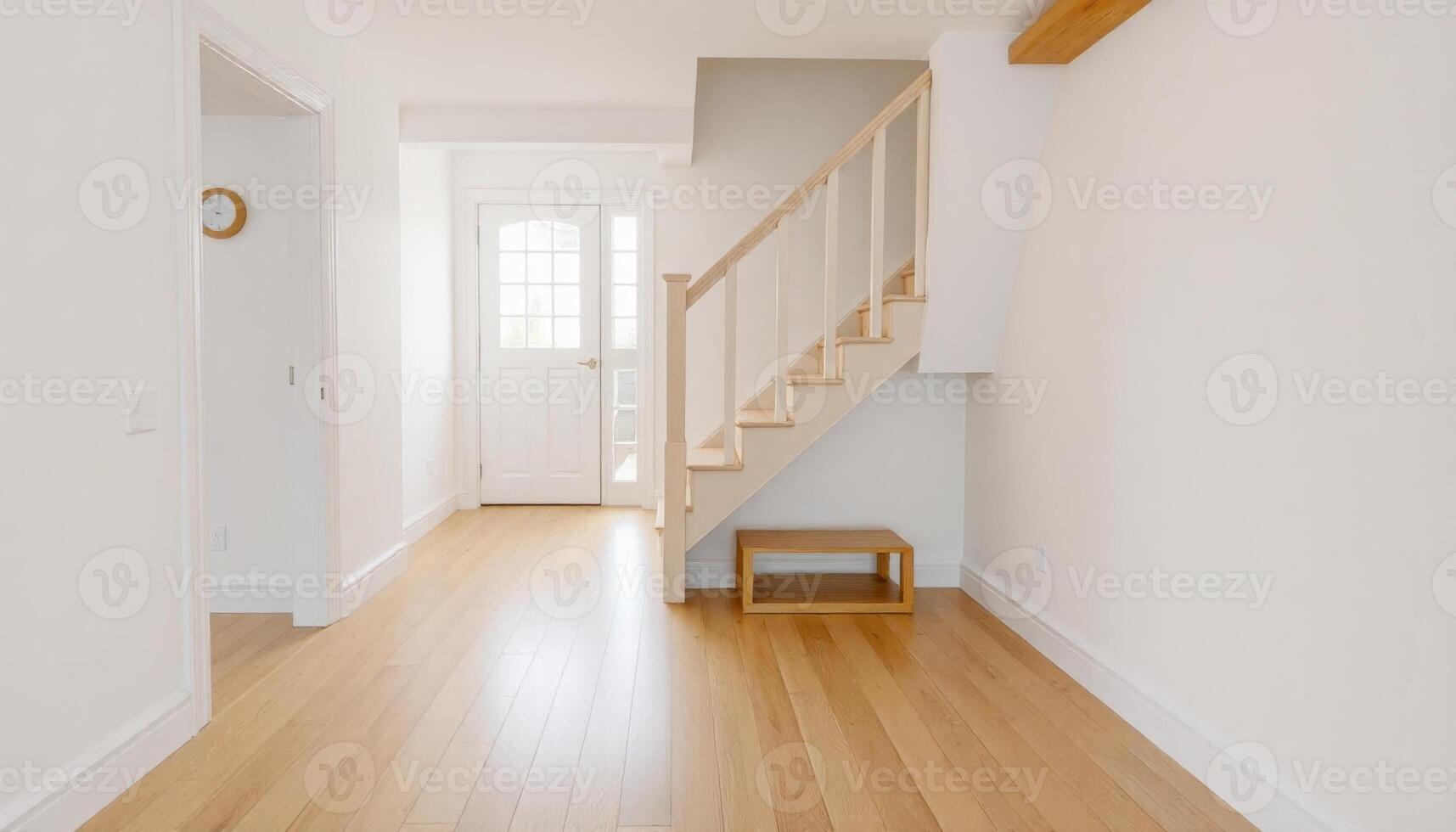 Bright and Airy Entryway with Wooden Staircase photo