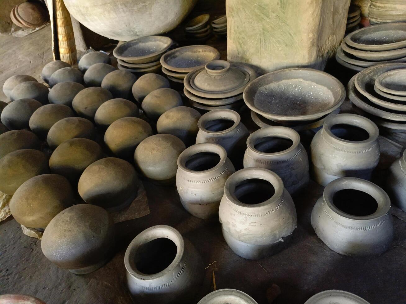Traditional Pottery like Village Pottery Art Crafting Pots in a Scenic Village Setting photo