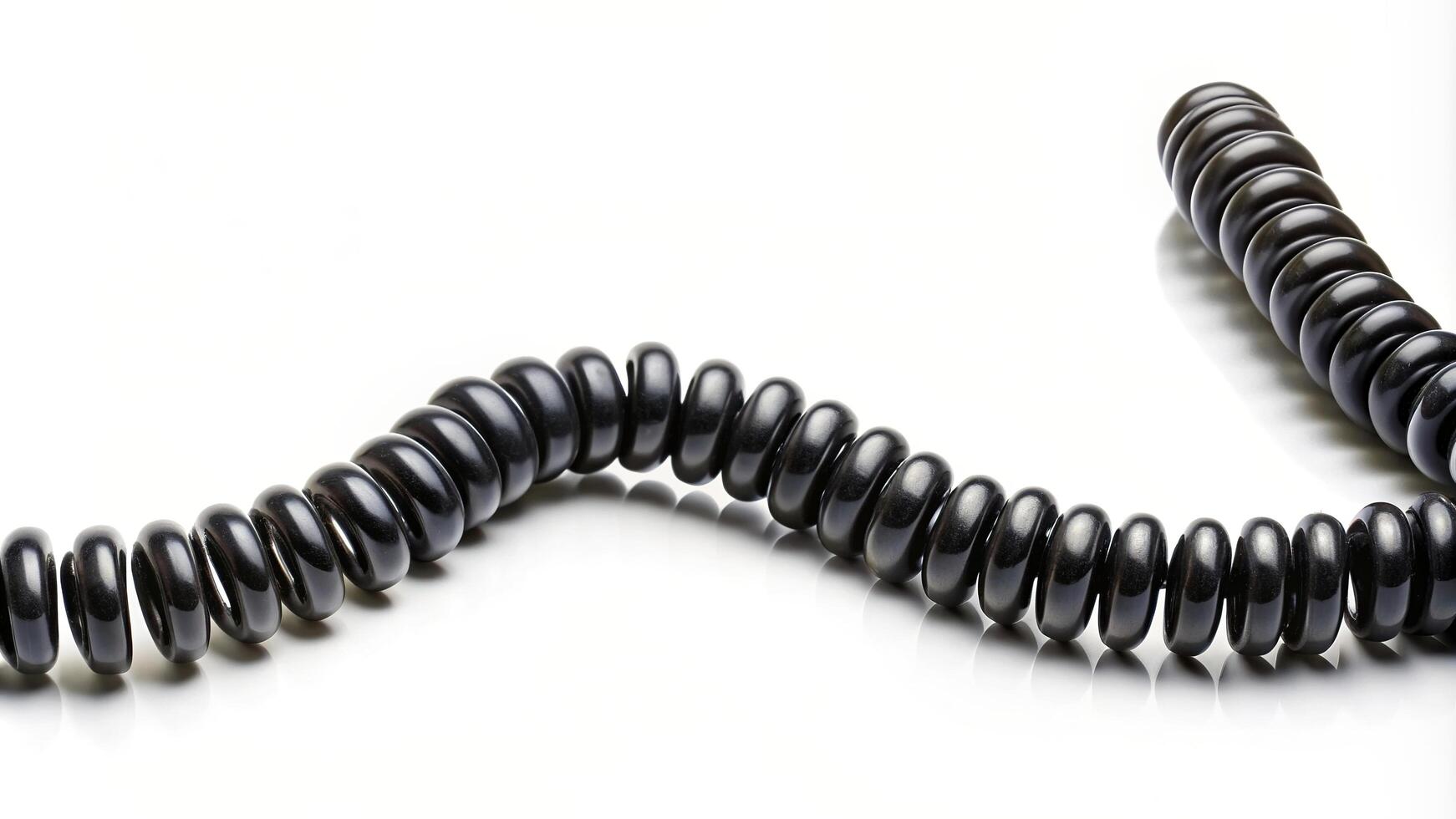 communication, twist, medium shot, telecommunication, technology,Black, swirl, connectivity, cord, isolated, A medium shot of a black spiral telephone cord isolated on a white background photo