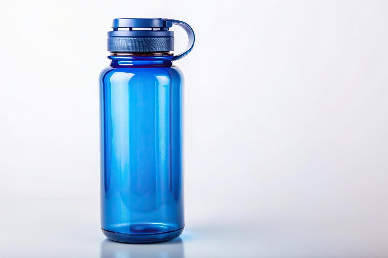 Blue reusable water bottle with secure lid on white background, blue, white background, secure lid, hydration, eye level, eco friendly photo