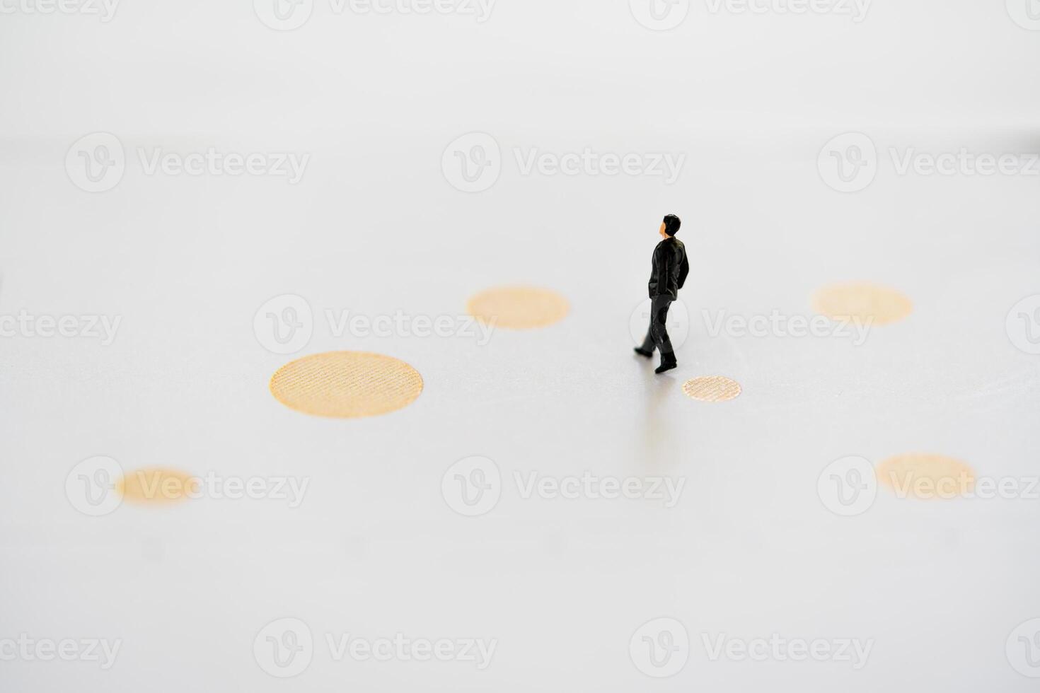 Miniature businessman walk to the direction. Business obstacle, financial, business growth concept photo