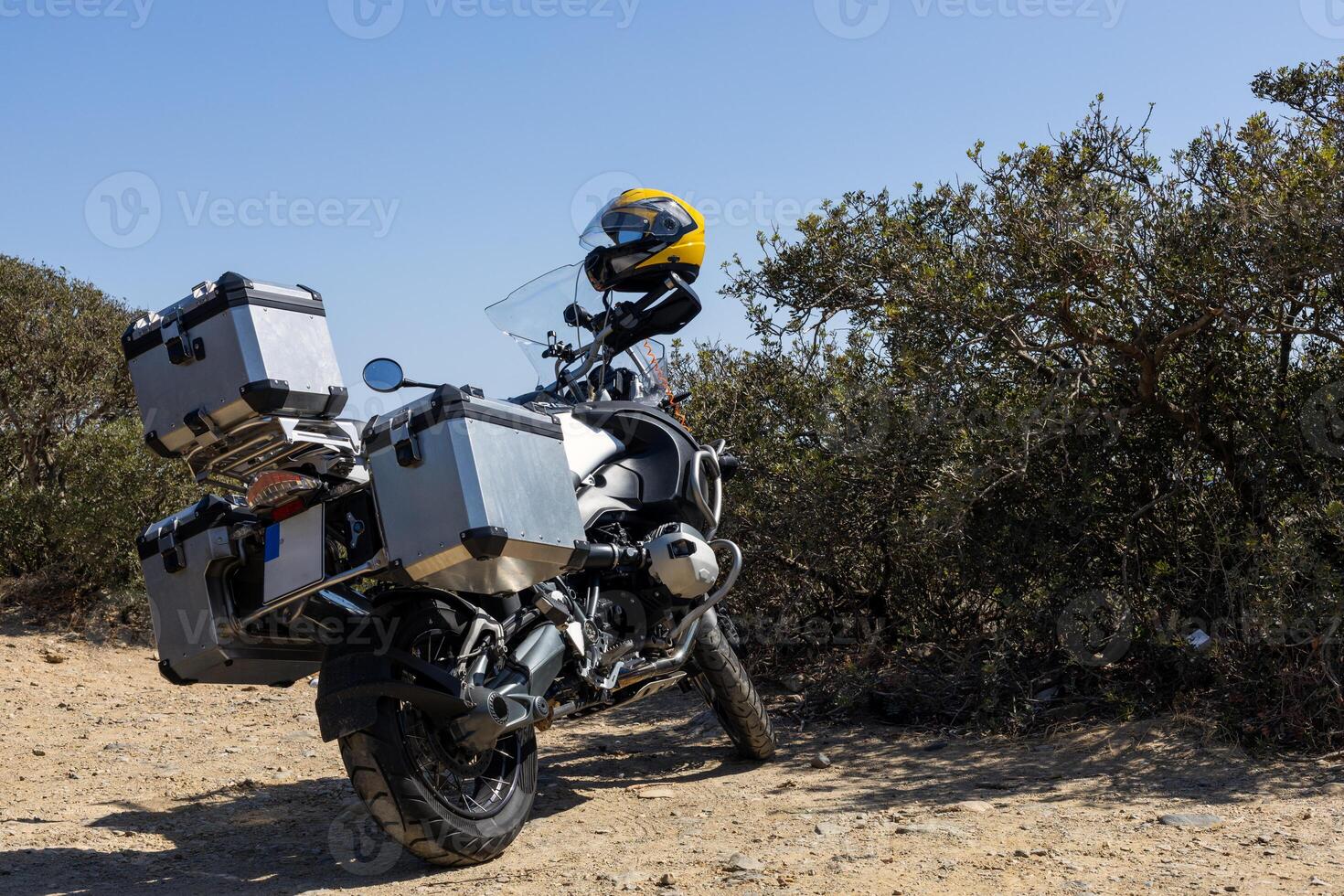 Adventure Motorcycle Parked on Dirt Path photo