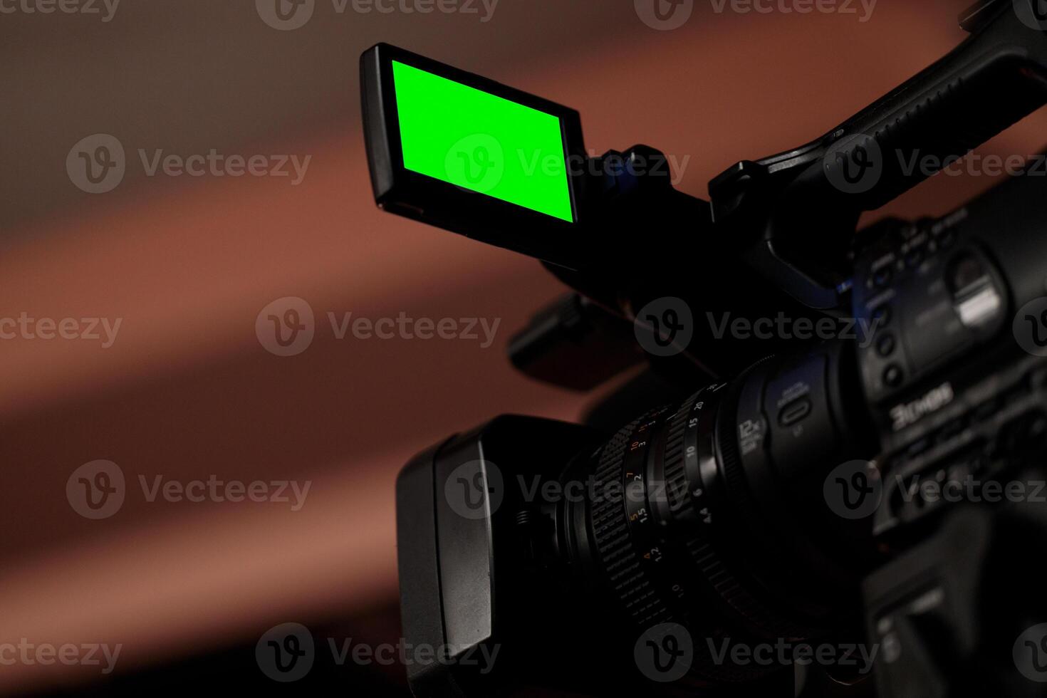 Close-up of Camera with Green Screen photo