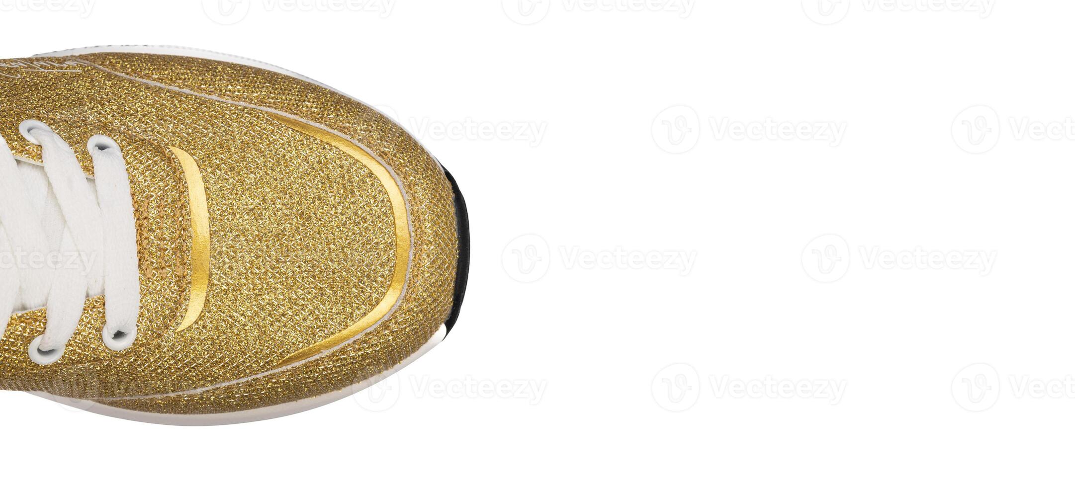 Close-up of Gold Glitter Sneaker Toe Detail photo