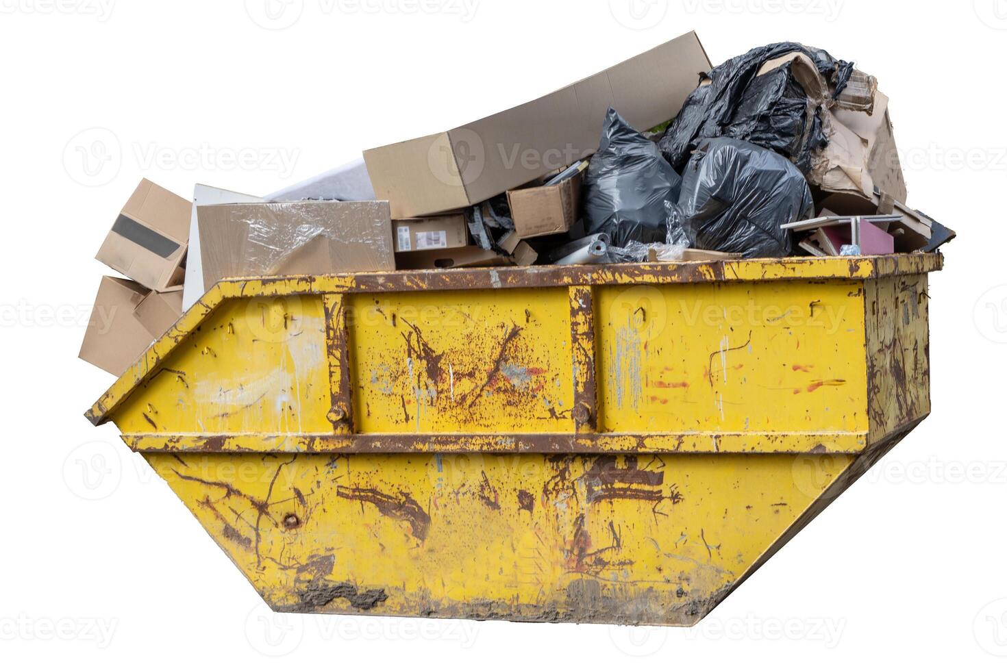 Yellow Dumpster Filled with Trash and Cardboard. photo