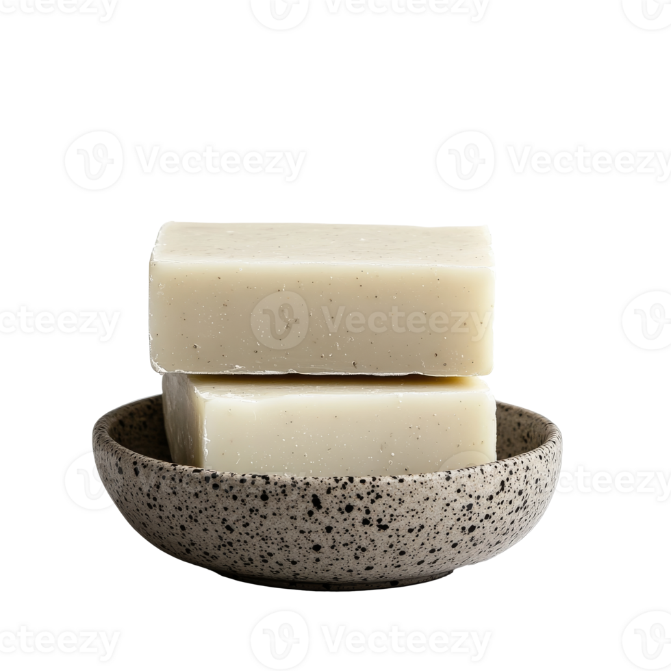 Natural soap bars stacked on a textured plate, cut out transparent png