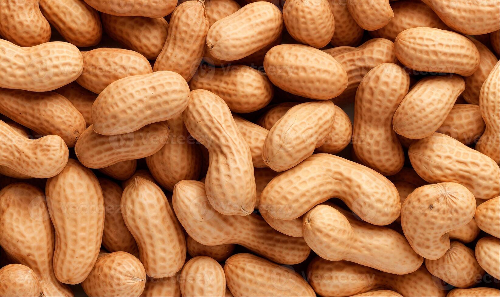 Unpeeled peanuts background, top view, close up texture photo