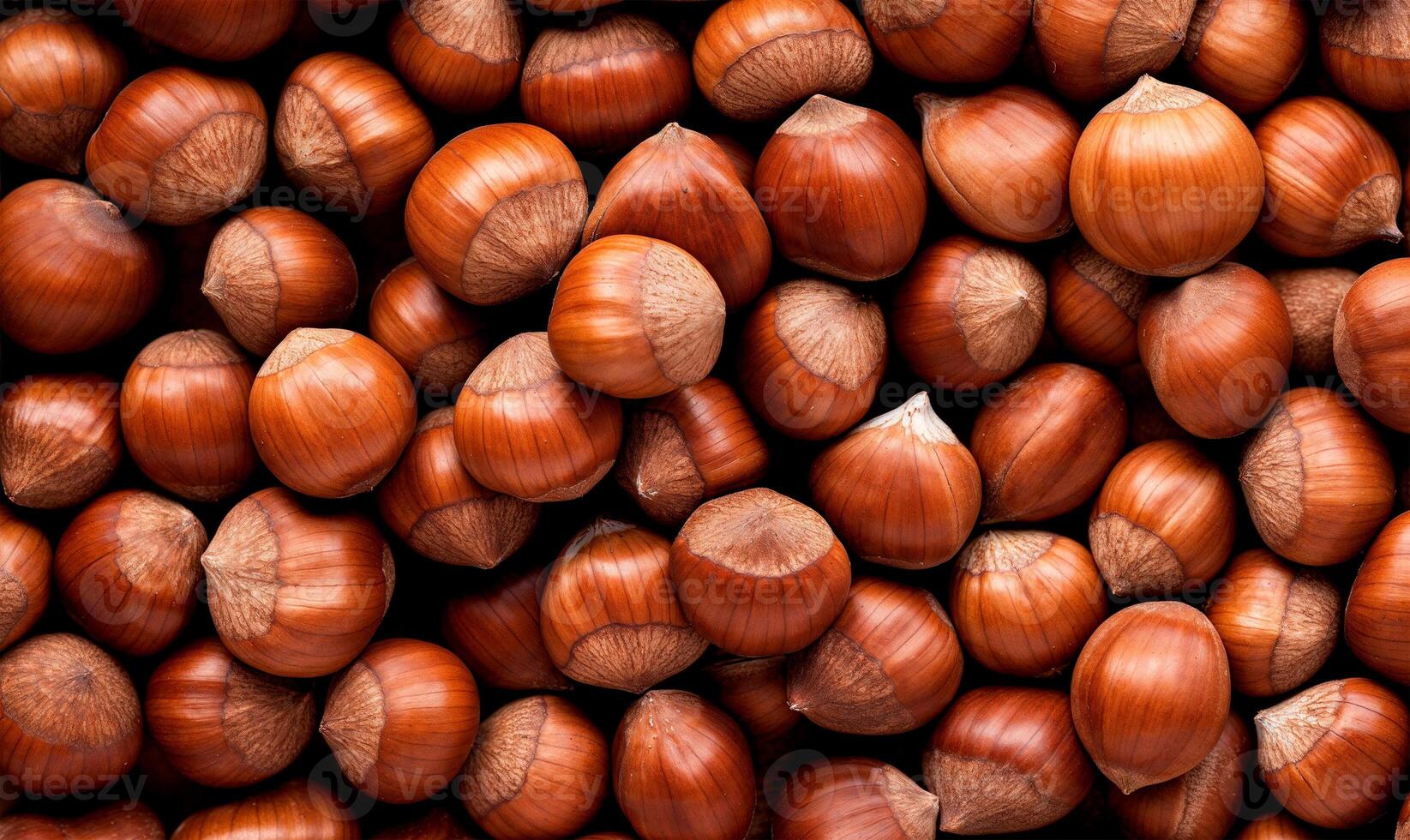 Hazelnuts background, top view, close up of hazelnut nuts texture photo