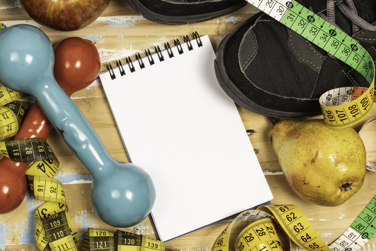 fruit for weight loss with measuring tape and equipment for exercise and diet, weight loss photo