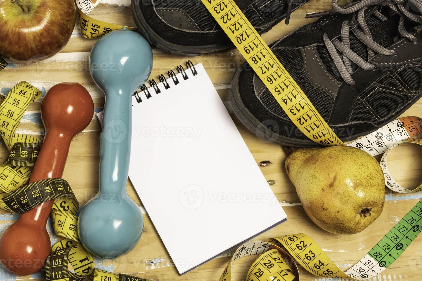 fruit for weight loss with measuring tape and equipment for exercise and diet, weight loss photo