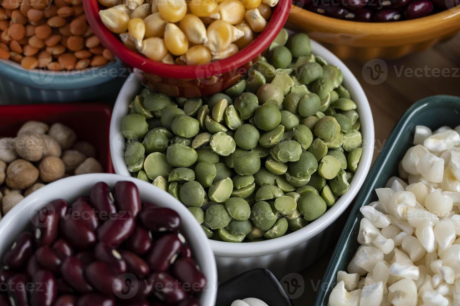 several pots with raw grains for preparing healthy food photo