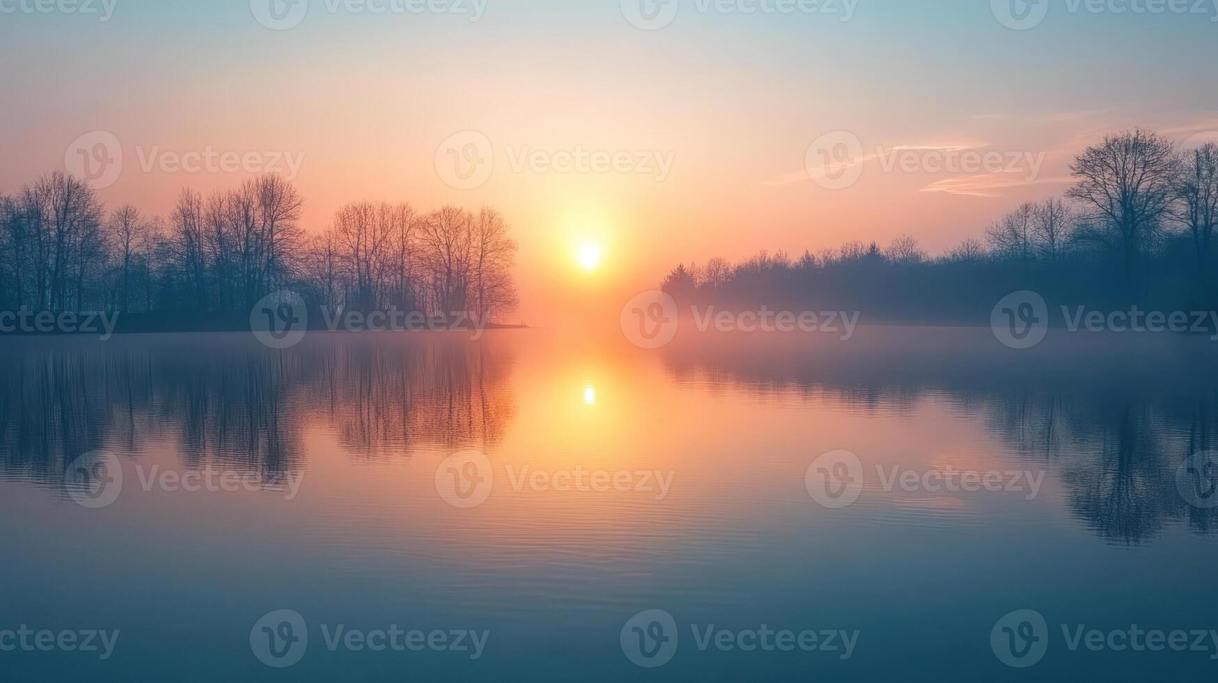 A serene sunrise reflected in calm lake, surrounded by trees, creates peaceful atmosphere. soft colors evoke tranquility and beauty. photo