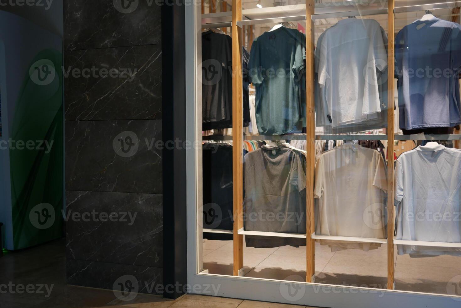 Chic and Stylish Display of Apparel in a Modern Retail Storefront for Shoppers to Enjoy photo