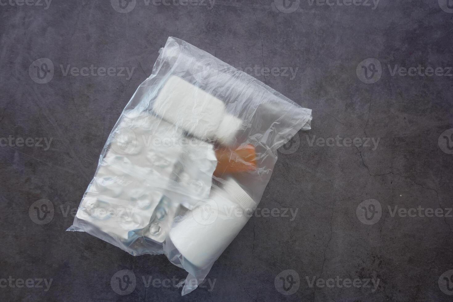 Packaged Medication Items Conveniently Stored in a Plastic Bag for Easy Access and Organization photo