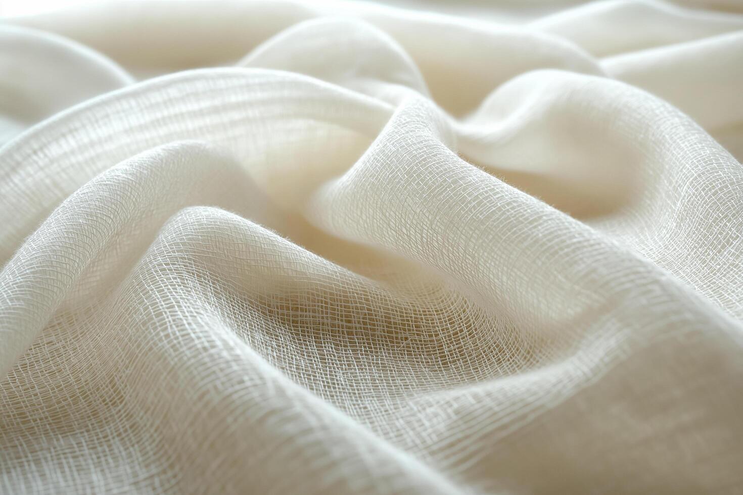 Soft, flowing white fabric with a delicate, airy texture, creating gentle waves and a light, ethereal appearance photo