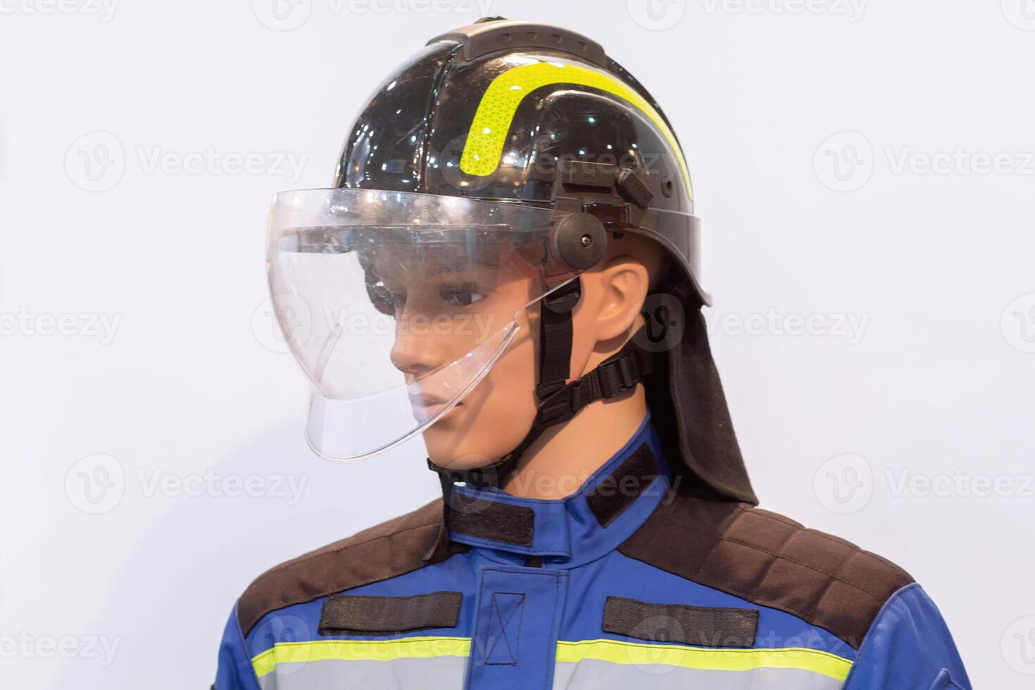 Mannequin in firefighter uniform and protective equipment photo