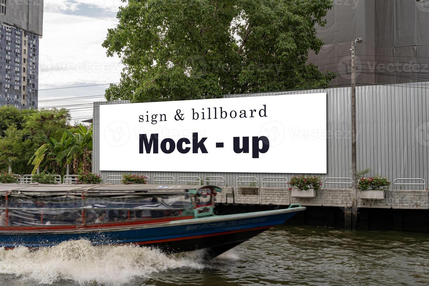 Mock up large advertising billboard with clipping path at corridor white screen view empty space for advertising on wall near corridor foreground is a boat by canal photo