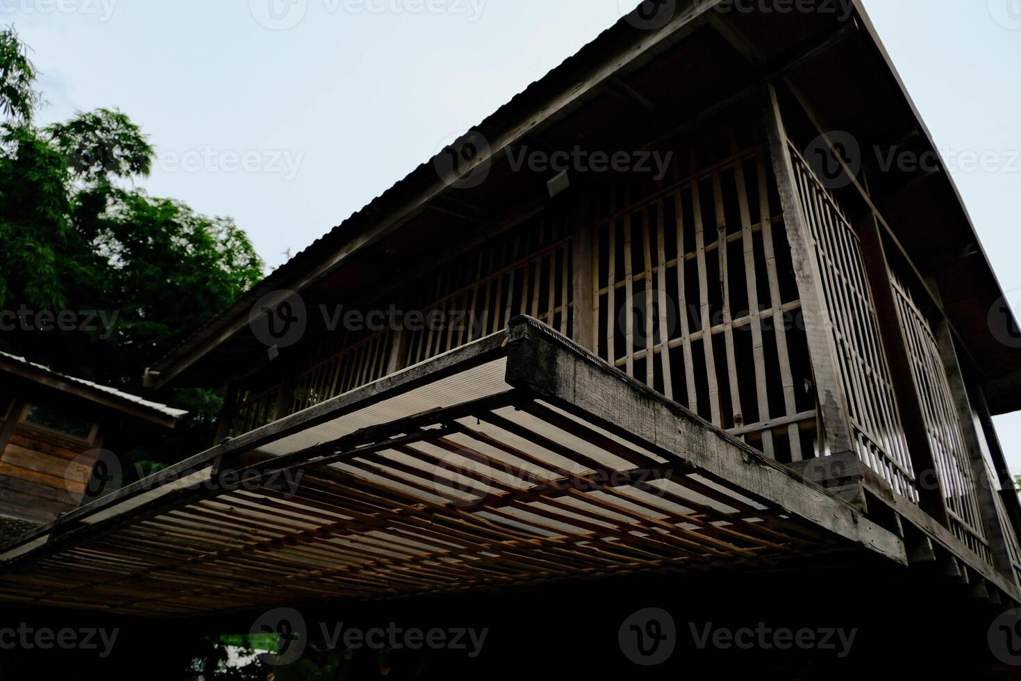 View of wooden house in the dark tone. photo