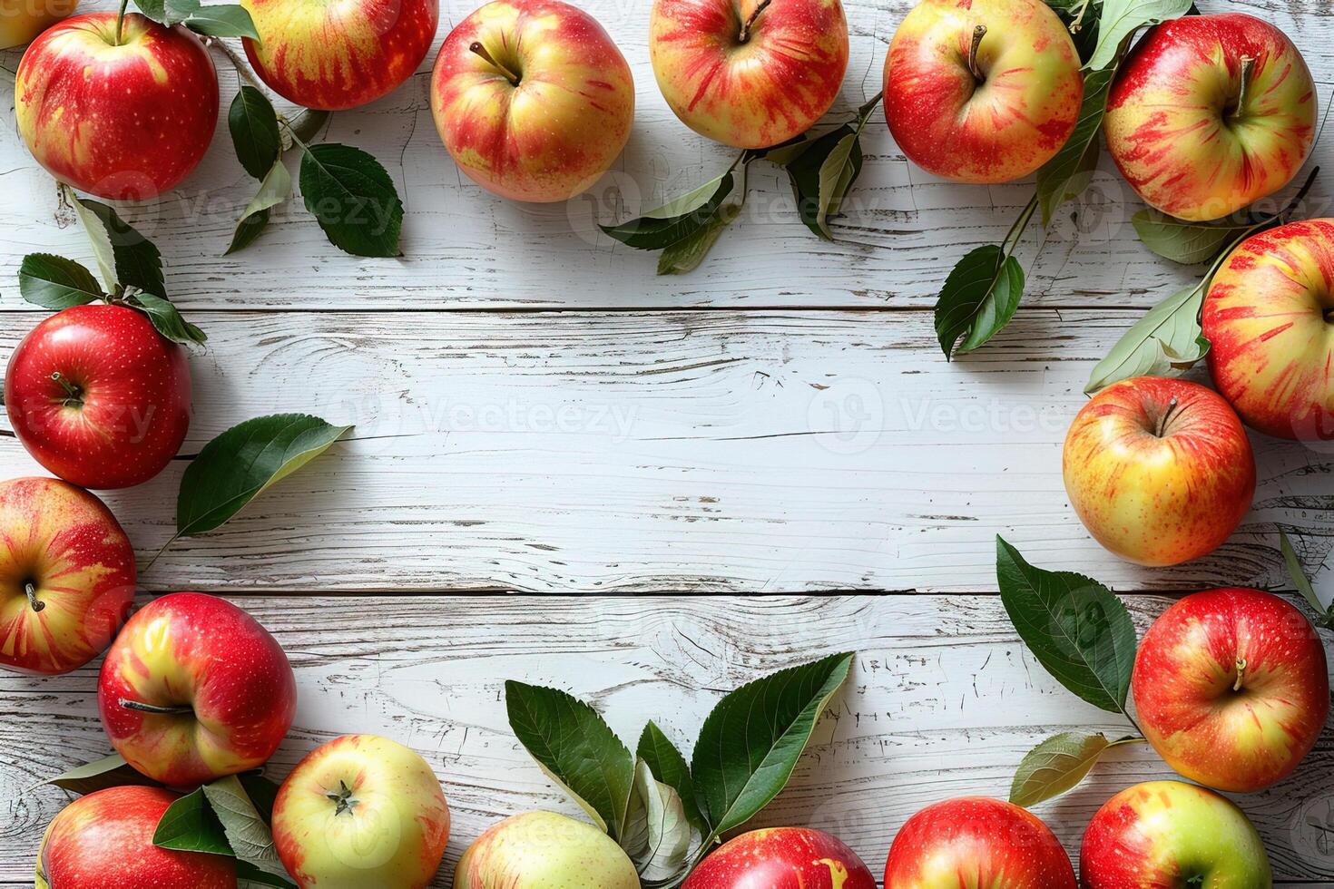 top view composition red ripe apples with leaves border frame on white wooden background with copy space photo