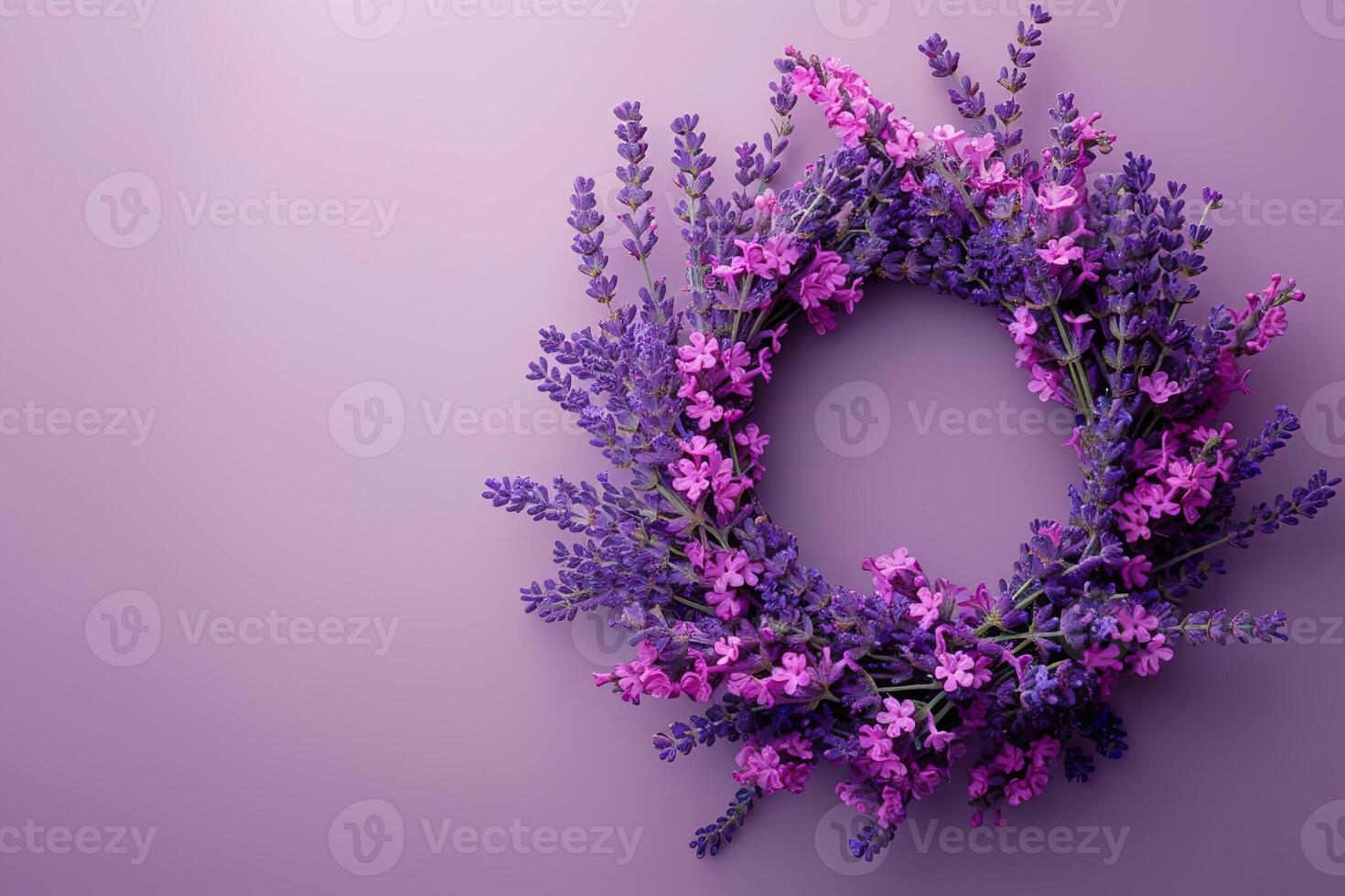 beautiful lavender wreath on purple background top view, floral template with copy space photo