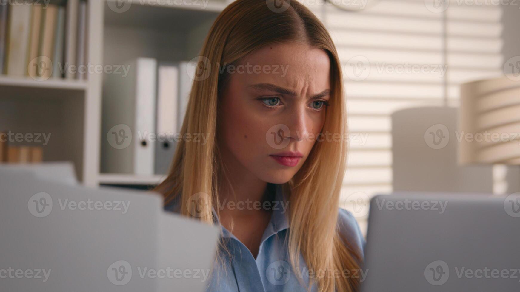Close up angry upset Caucasian woman user using laptop in home office frustrated mad confused shocked computer problem say what shock failure online stressed girl businesswoman mistake software error photo