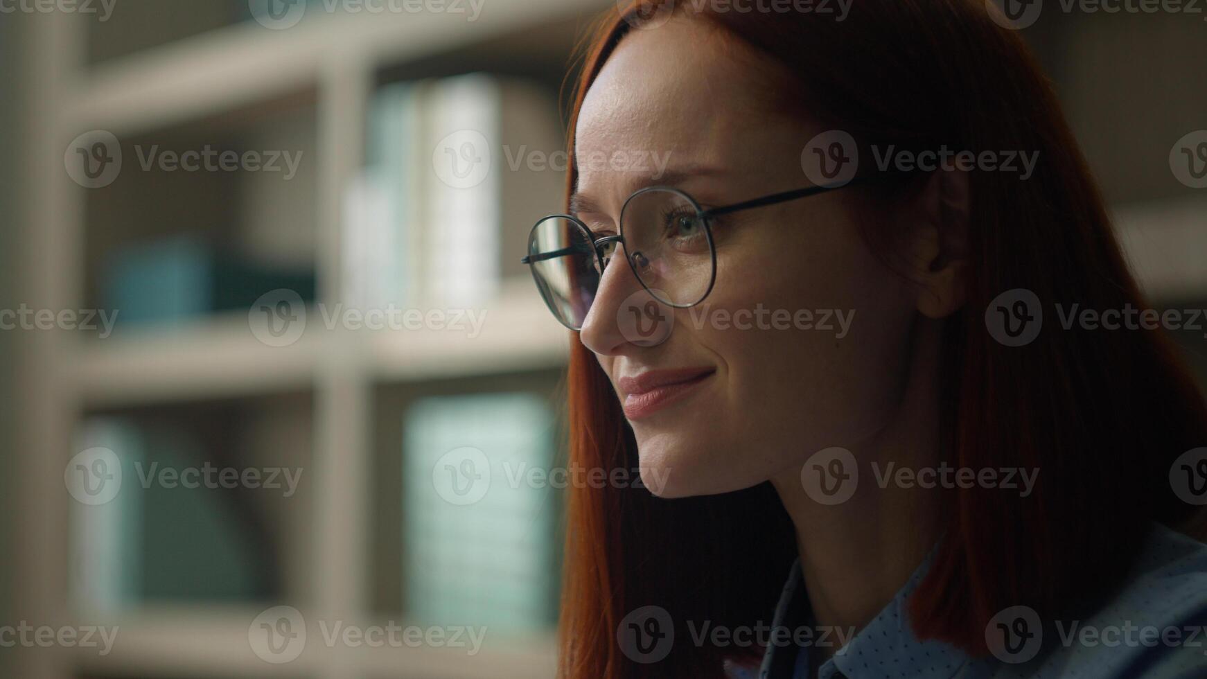 Close up pensive Caucasian business woman looking away thinking smiling thoughtful girl businesswoman in glasses think ponder idea solution calm look distance dream at home office contemplate dreaming photo