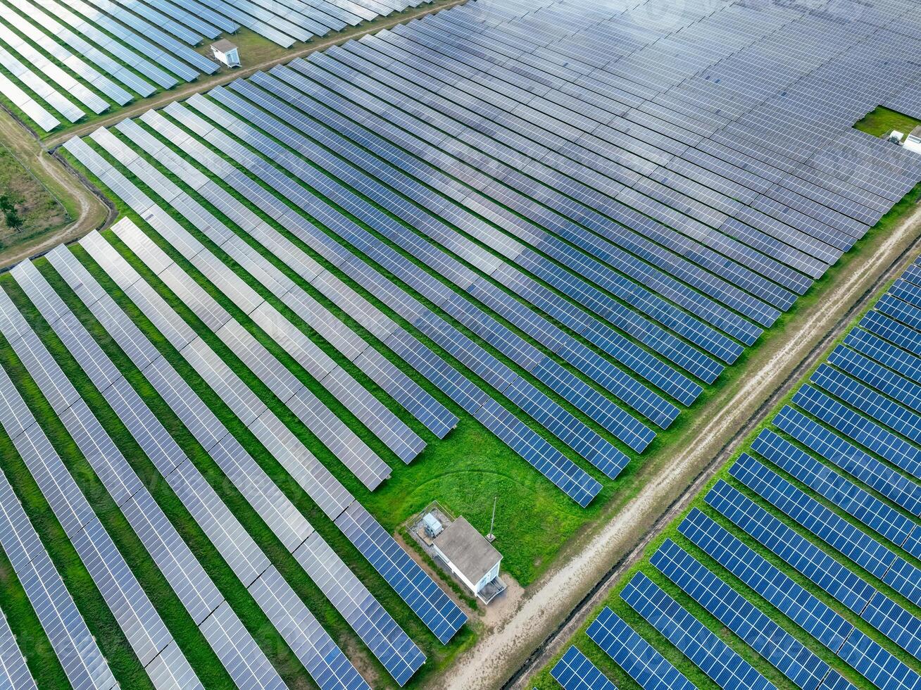 Aerial view of solar farm. Sustainable renewable energy and modern photovoltaic technology for eco-friendly electricity production. Solar power station. Green energy solutions. Solar panel technology. photo