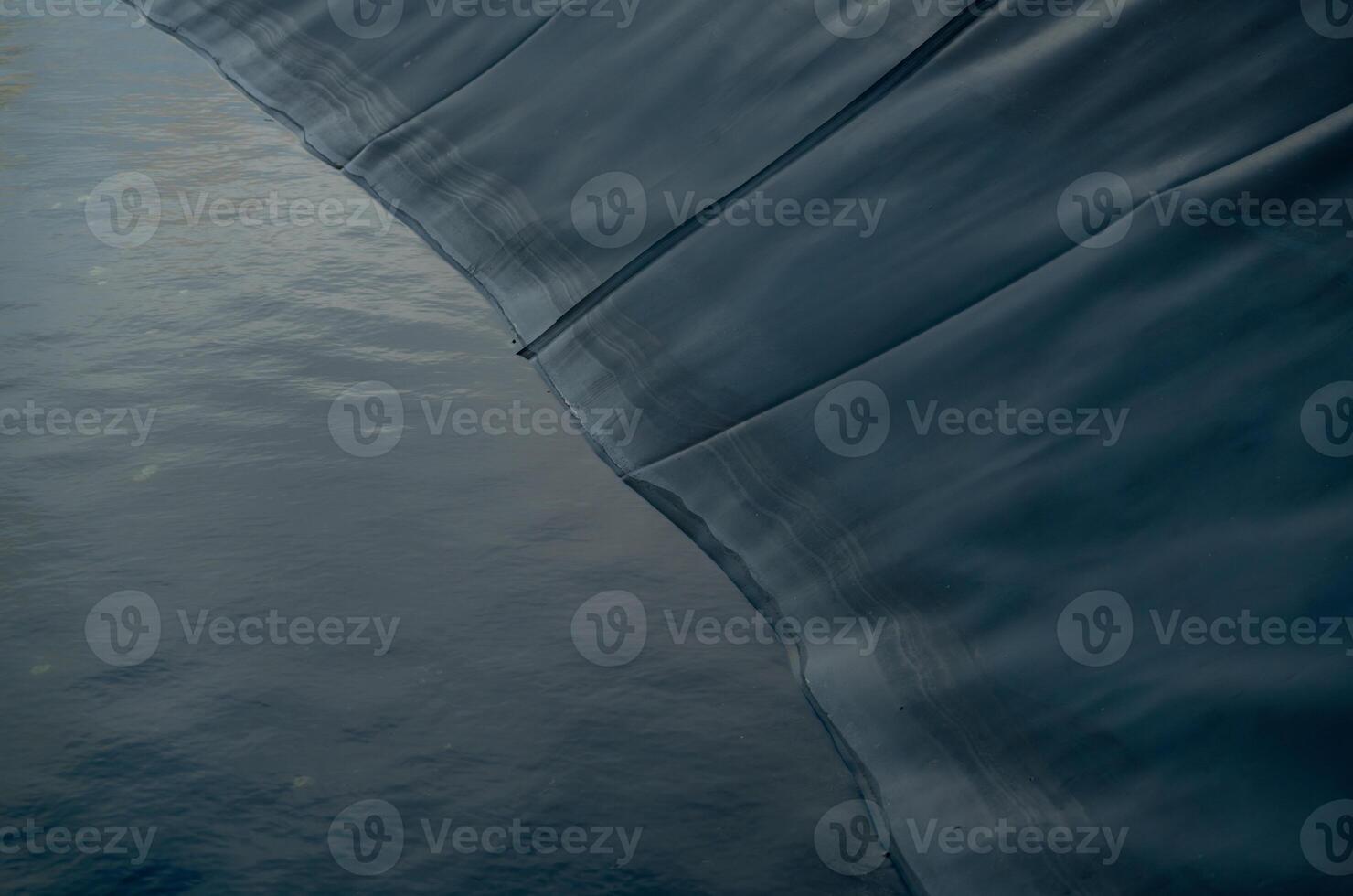 Aquaculture farming pond liner system. HDPE geomembrane technology. Water containment and environmental protection in sustainable fish farming. High-density polyethylene transforms aquaculture ponds. photo