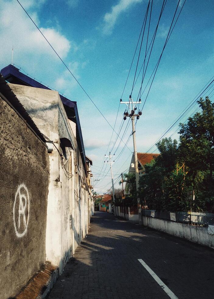 A Wall With A Letter Of Grafitti photo