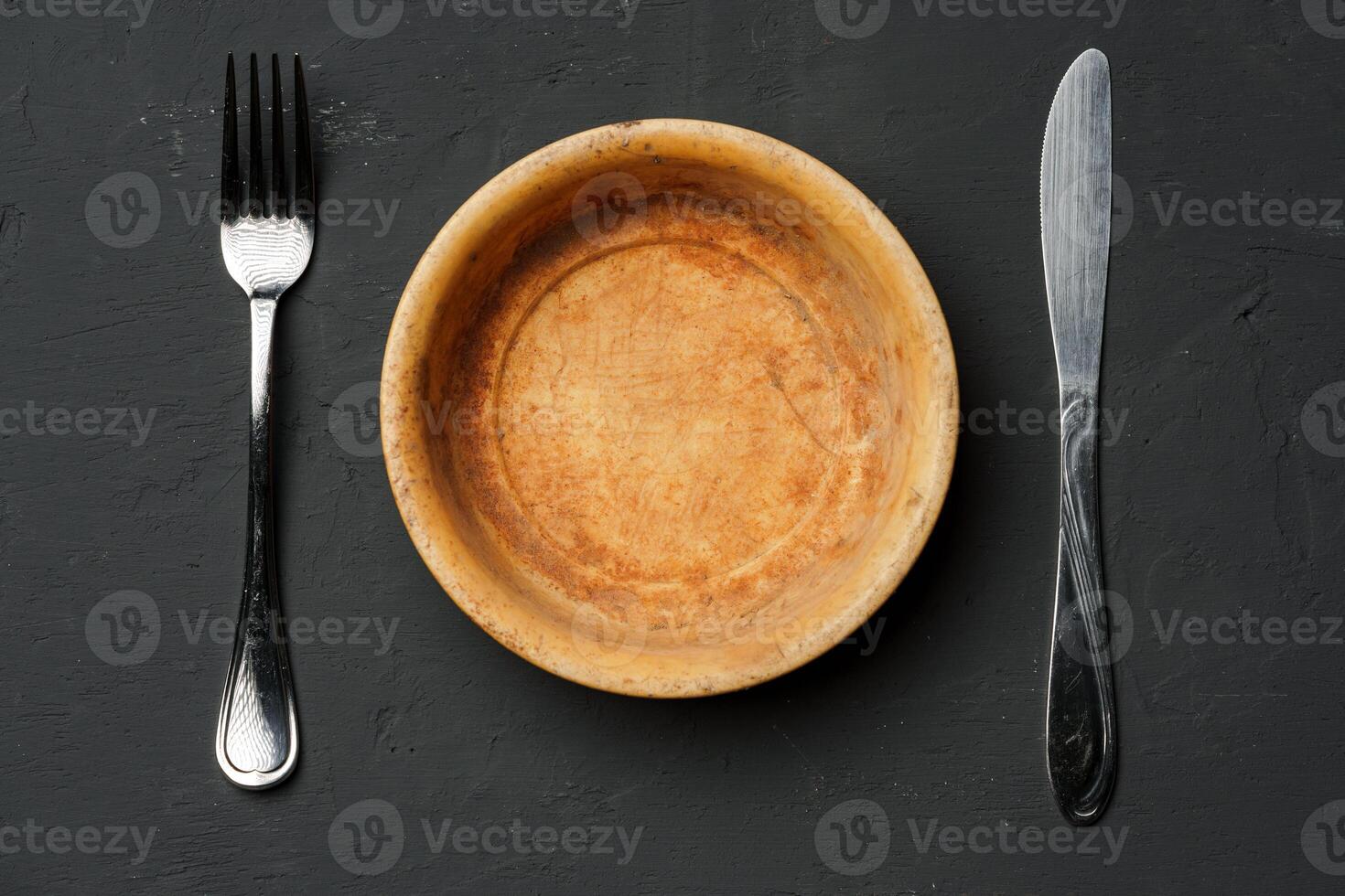 Empty bowl on dark background with copy space photo