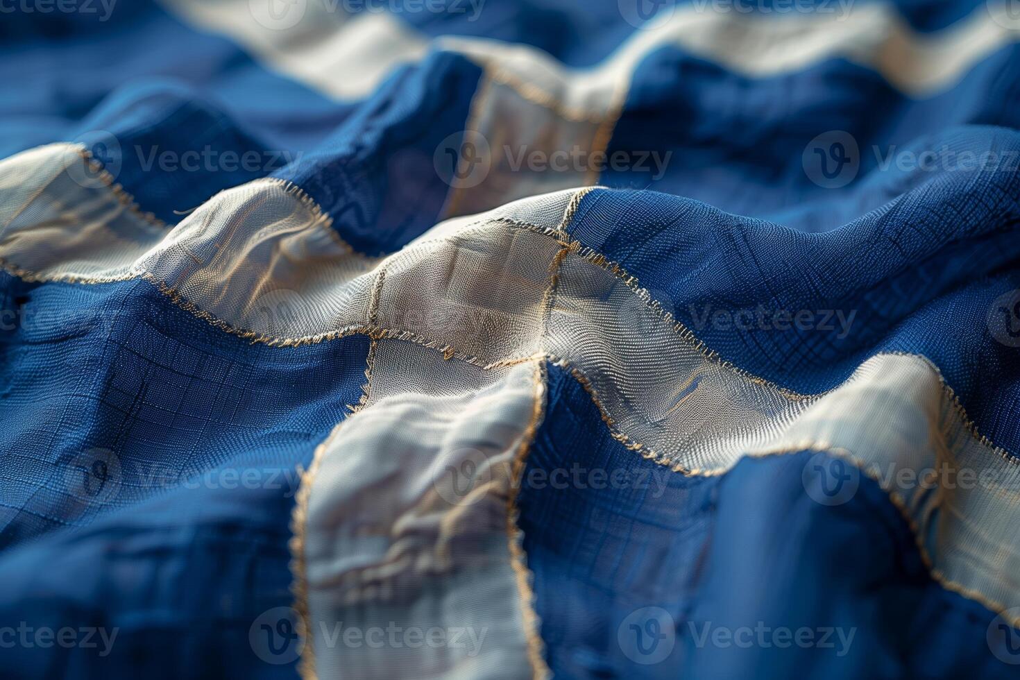 Close-up view of textured blue fabric with contrasting white stripes showcasing intricate weaving and design elements in natural light photo