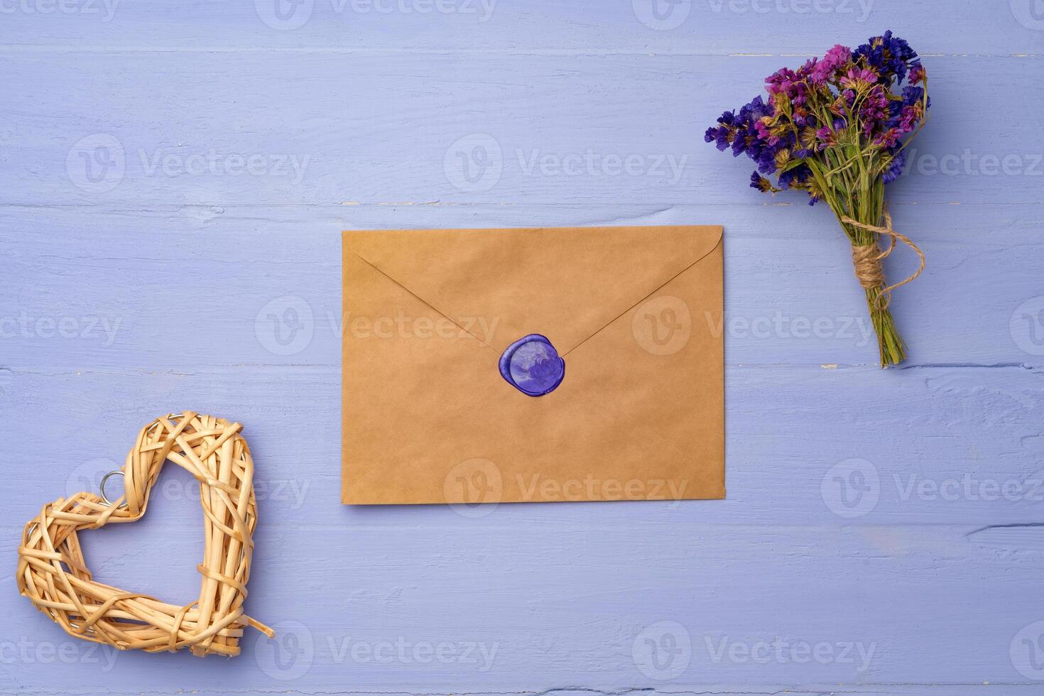 Letter envelope on lavender wooden background, copy space photo