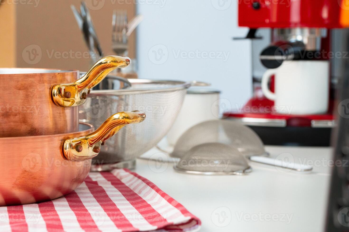 Kitchen utensils on a modern home kitchen table top photo