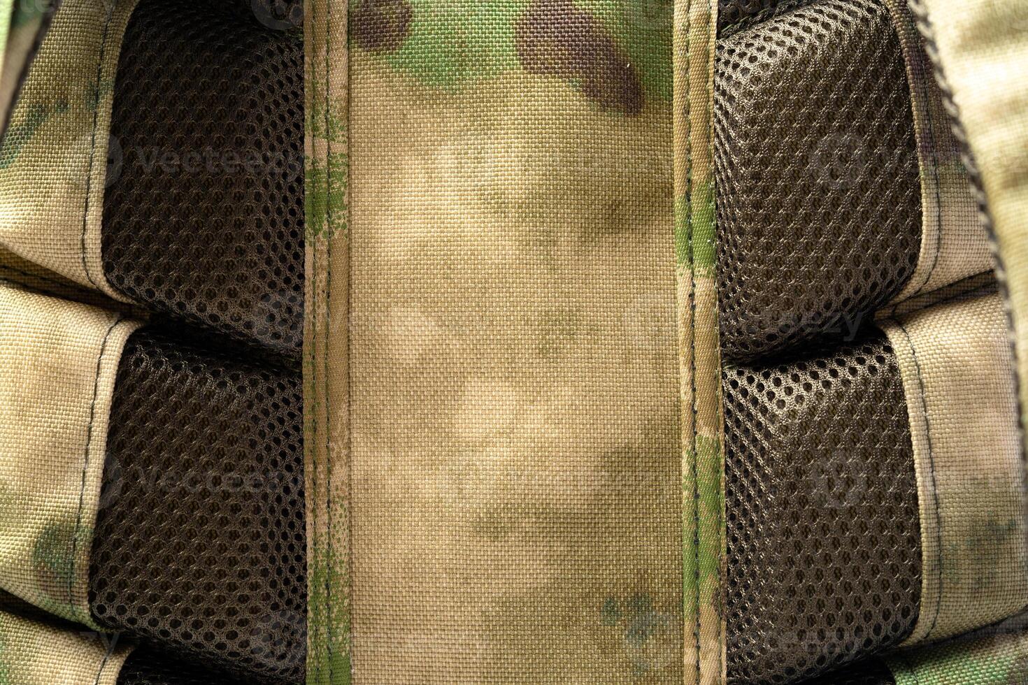 Close up still life of a green army tactical backpack photo