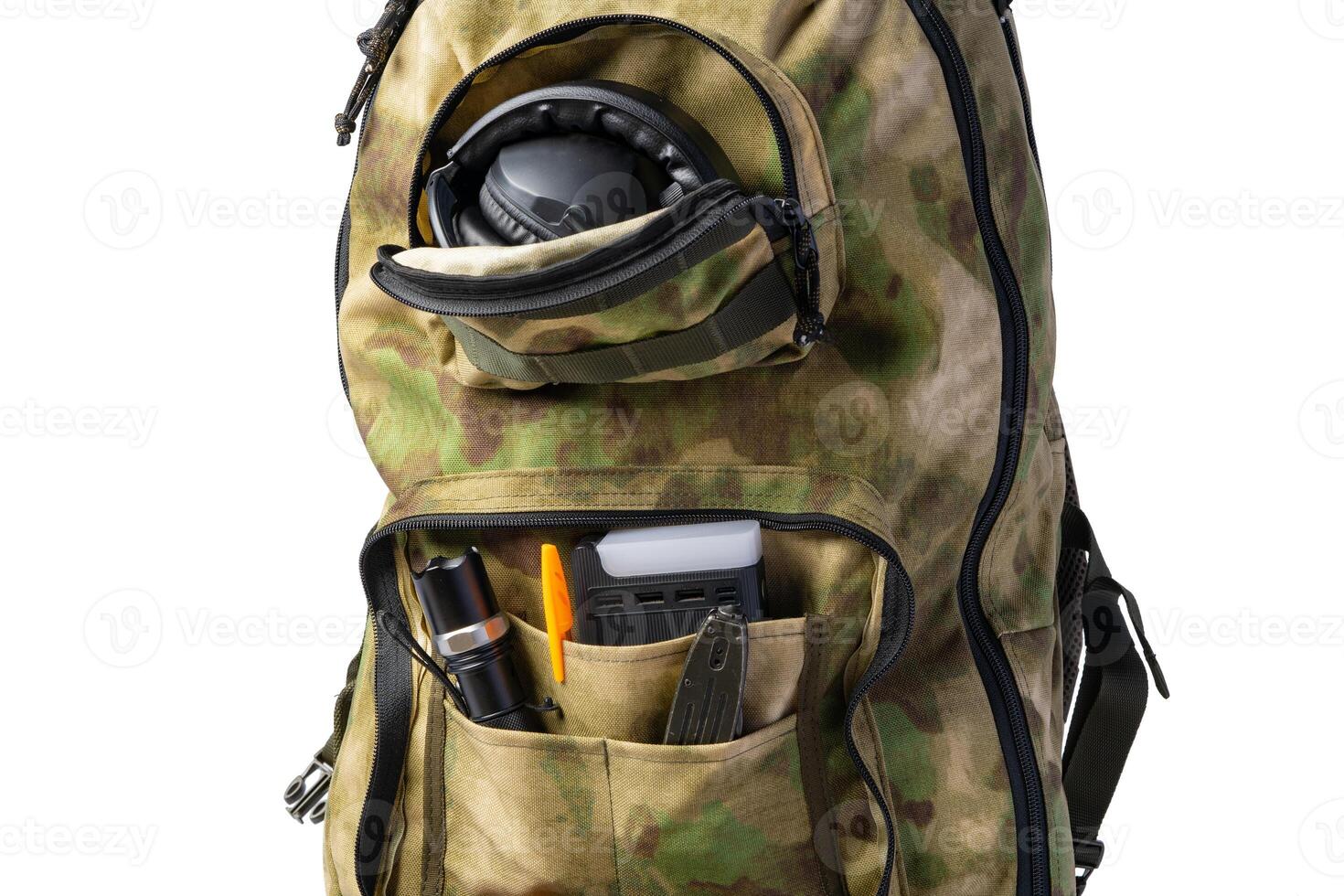 Open military backpack of khaki color on a white background photo
