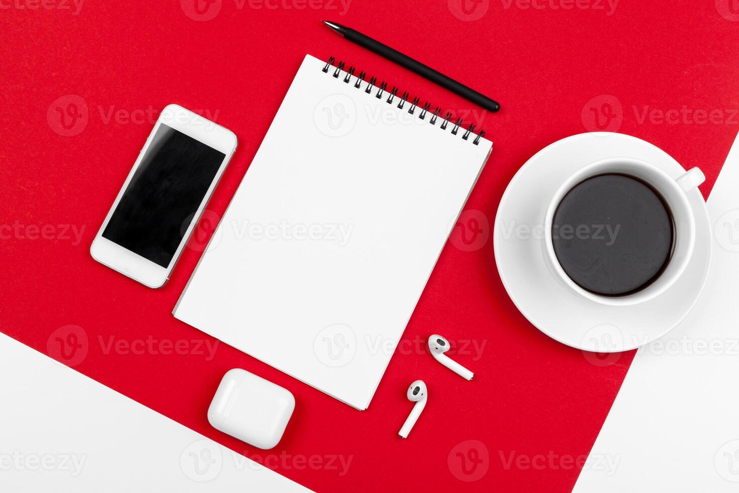 Mock up with copy space with smartphone on bright red background photo