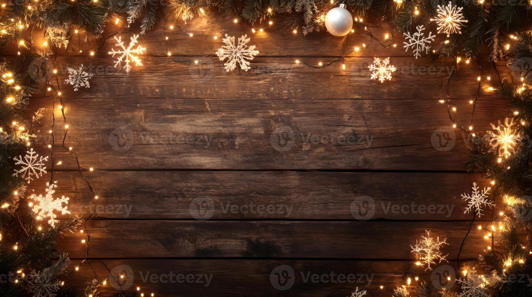 A festive wooden surface adorned with Christmas lights, snowflakes, ornaments, and pine branches, creating a cozy holiday atmosphere, photo
