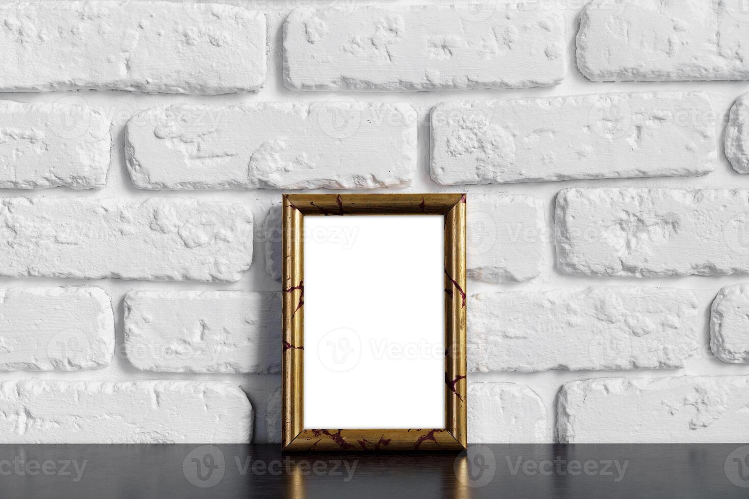 Photo frame with copy space against white brick wall