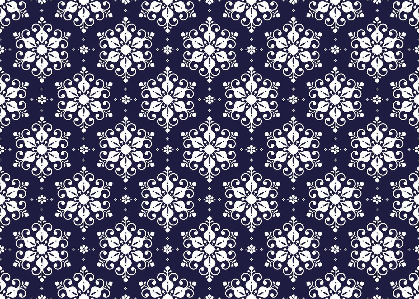 White symbol floral on dark blue background, ethnic fabric seamless pattern, design for cloth, carpet, batik, wallpaper, wrapping etc. vector