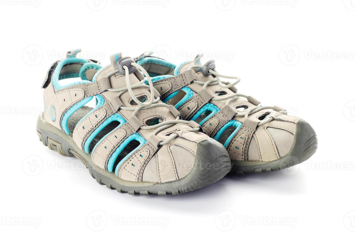 Close-Up of Beige and Blue Sport Sandals on White photo