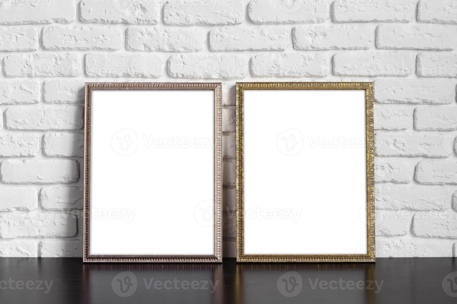 Blank picture frame against brick wall with copy space photo