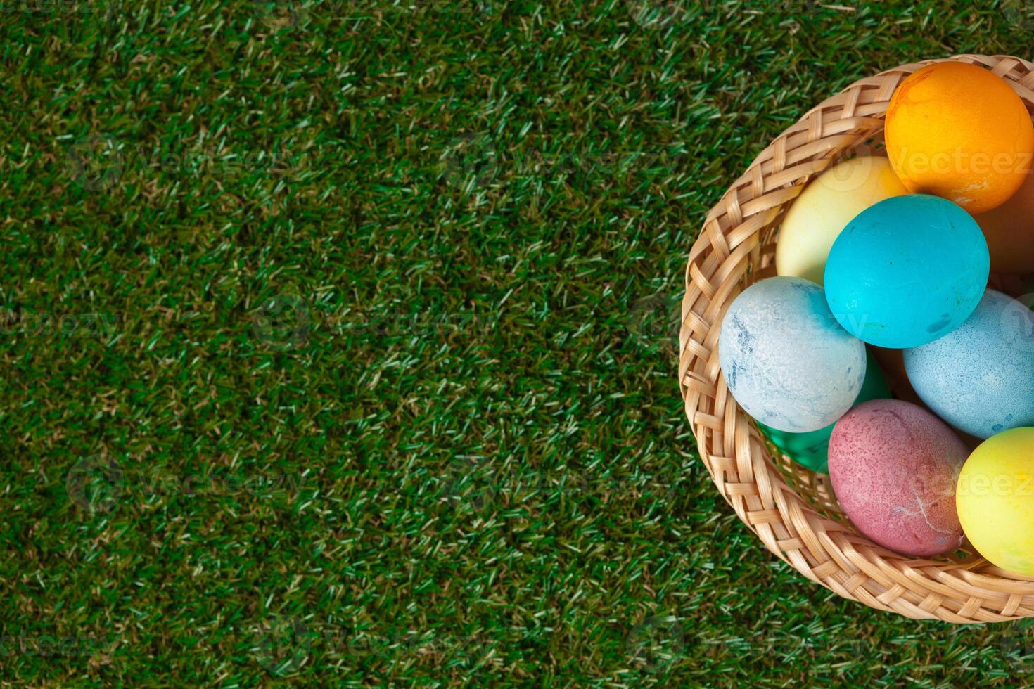 Easter eggs on green grass photo