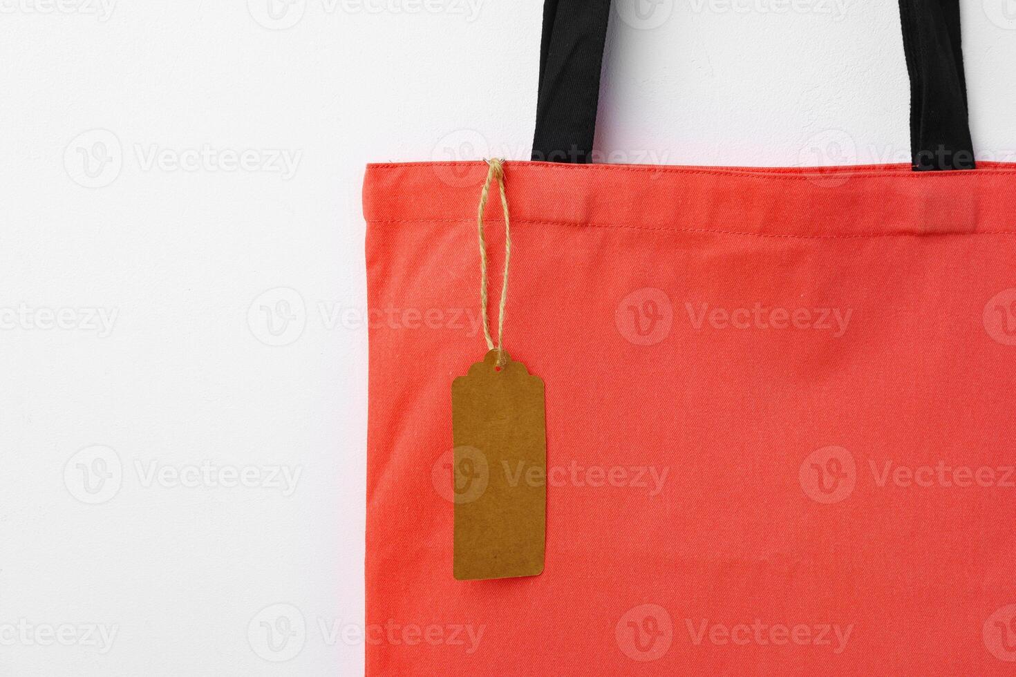 Eco bag for shopping with blank tag on white background photo