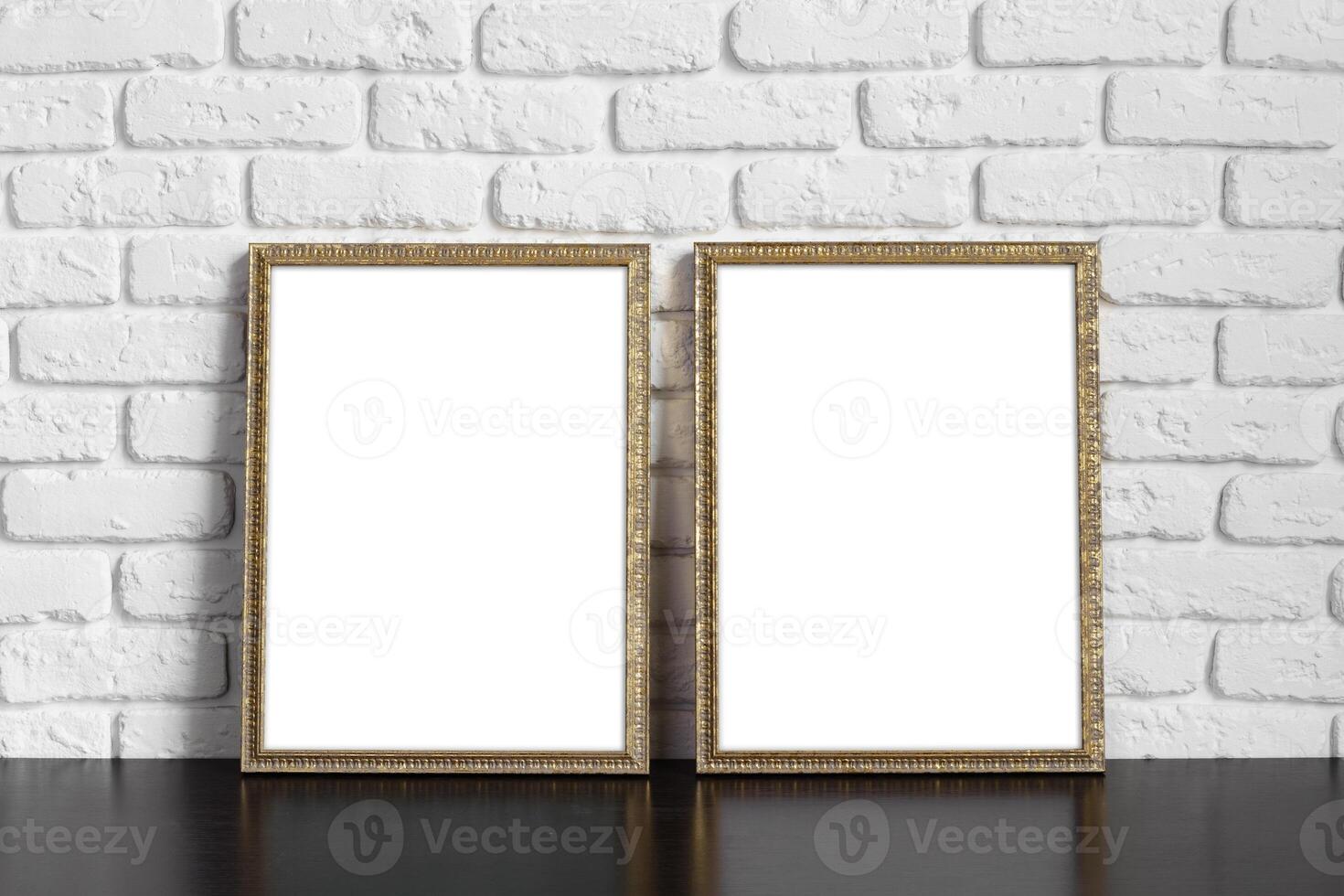 Blank picture frame against brick wall with copy space photo