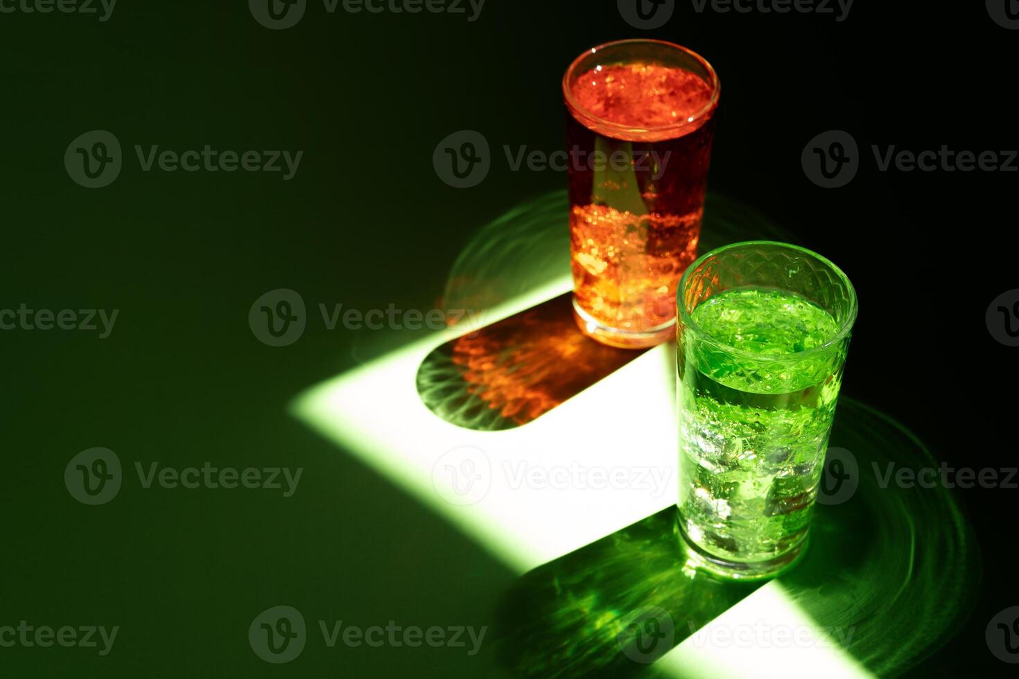 Summer alcohol cocktail in sun light beam photo
