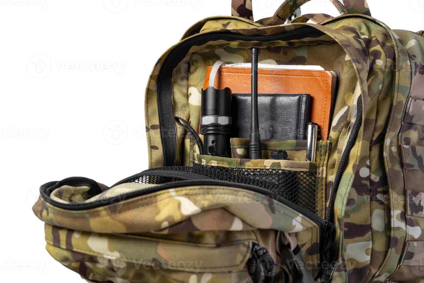 Open military backpack of khaki color on a white background photo