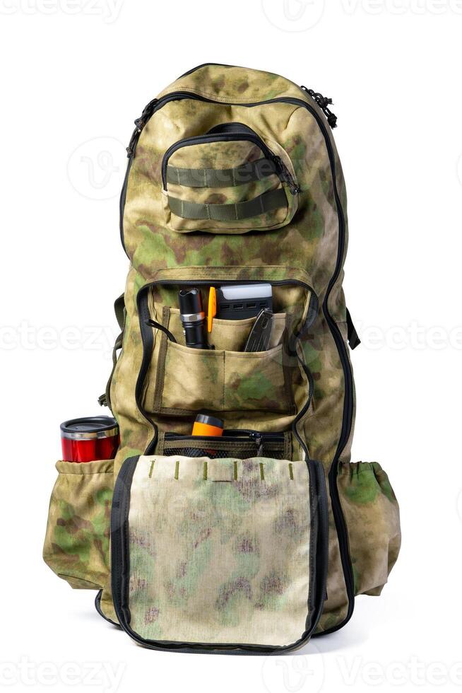 Open military backpack of khaki color on a white background photo