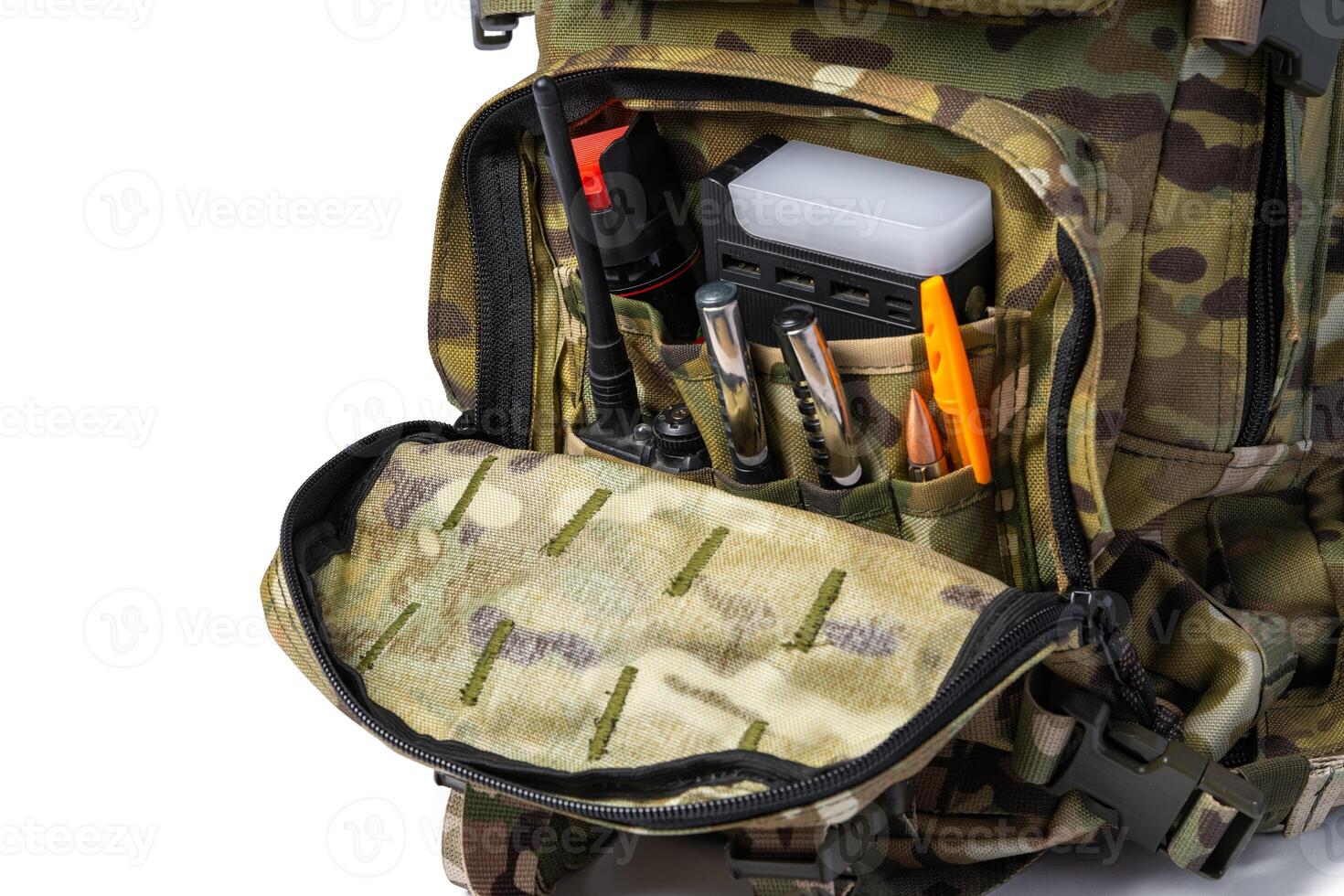 Open military backpack of khaki color on a white background photo