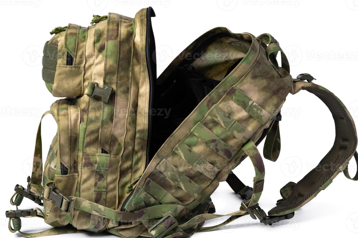 Open military backpack of khaki color on a white background photo